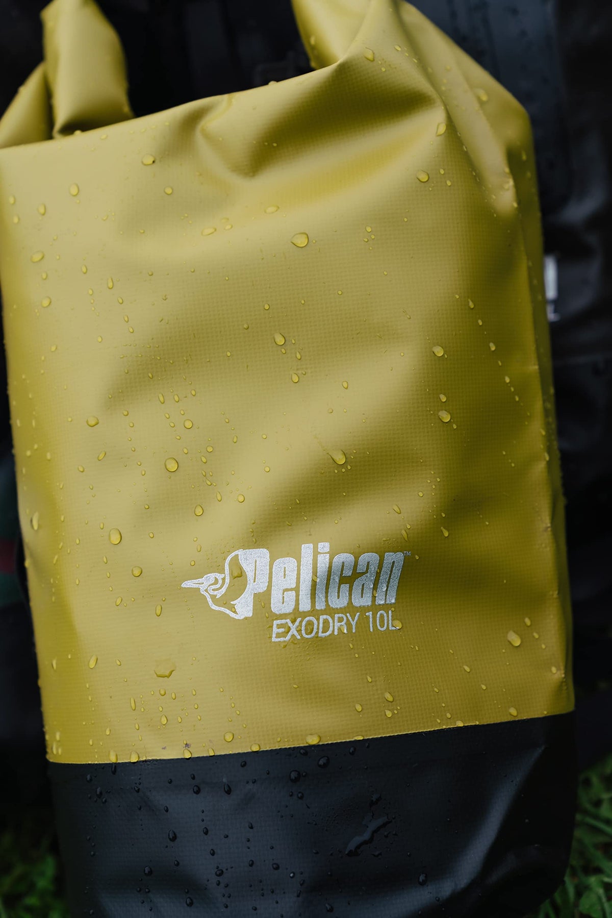 Pelican ExoDry 20L Medium Drybag - Waterproof - Shoulder Straps - Thick & Lightweight - Roll Top Dry Compression - Keeps Gear Dry for Kayaking, Rafting, Hiking and Fishing - Black